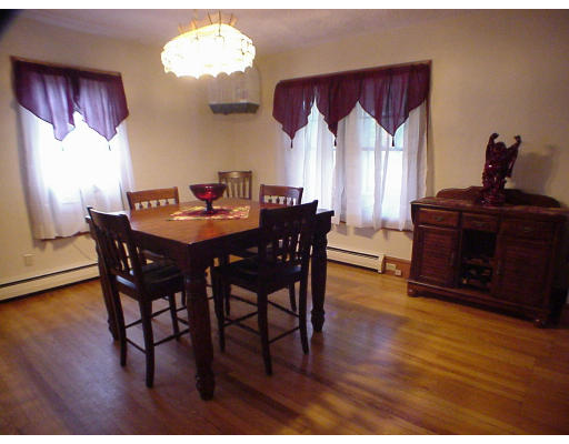 2146 Wilbraham Road Springfield, MA 01129 - Photo 4 of 8 a view of a dining room with furniture window and wooden floor