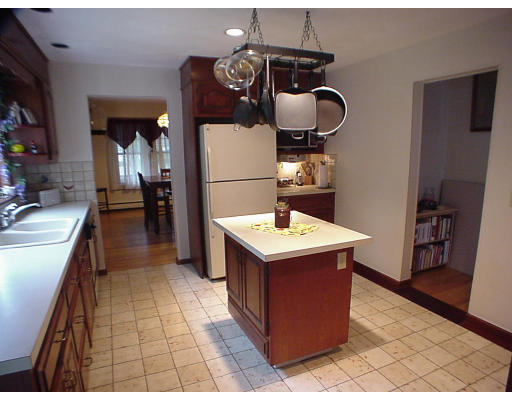 2146 Wilbraham Road Springfield, MA 01129 - Photo 7 of 8 a kitchen with a sink and cabinets