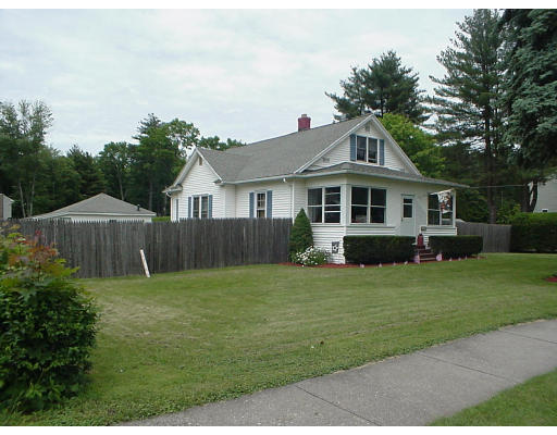 2146 Wilbraham Road Springfield, MA 01129 - Photo 8 of 8 a front view of a house with a yard