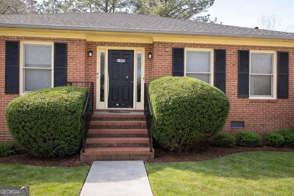 a view of a house with a garden