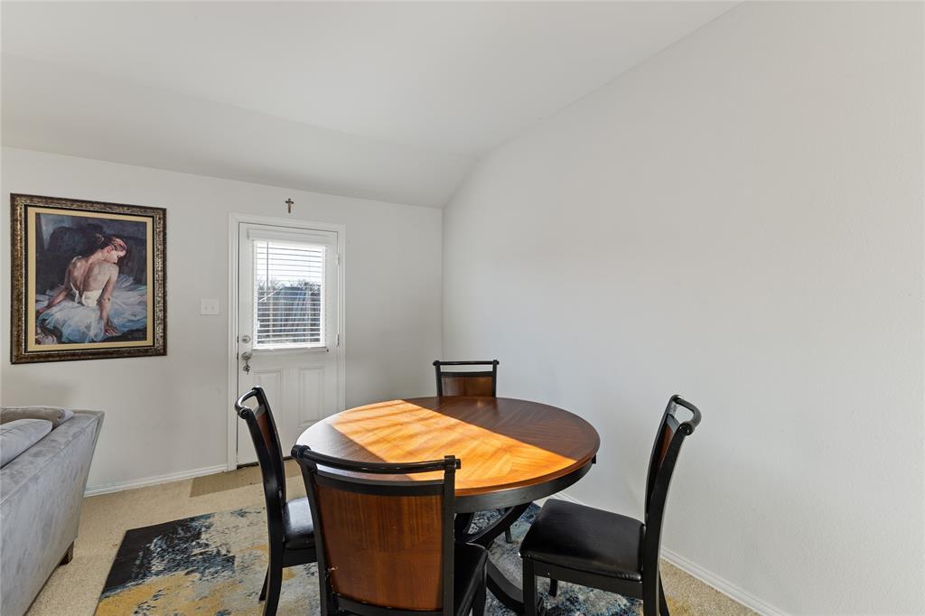 2404 Atlantic Avenue Anna, TX 75409 - Photo 20 of 26 a view of a dining room with furniture and a window