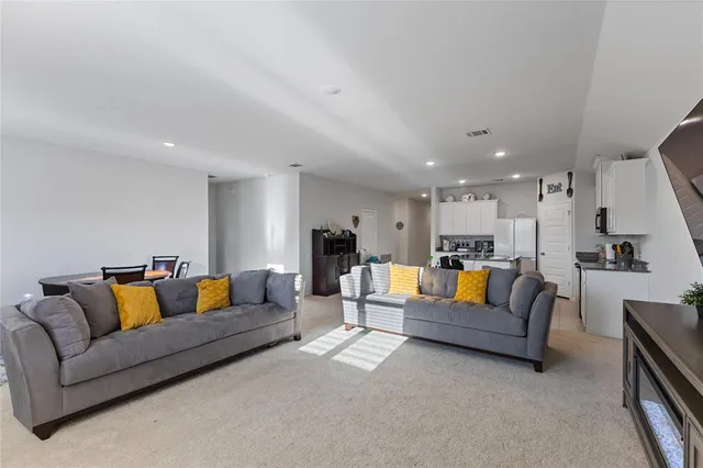 a living room with furniture and a couch