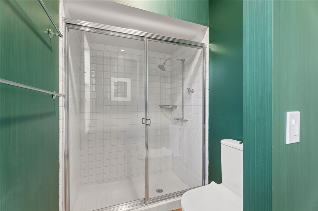 201 Sundial Court Vero Beach, FL 32963 - Photo 24 of 35 a bathroom with a toilet and a shower