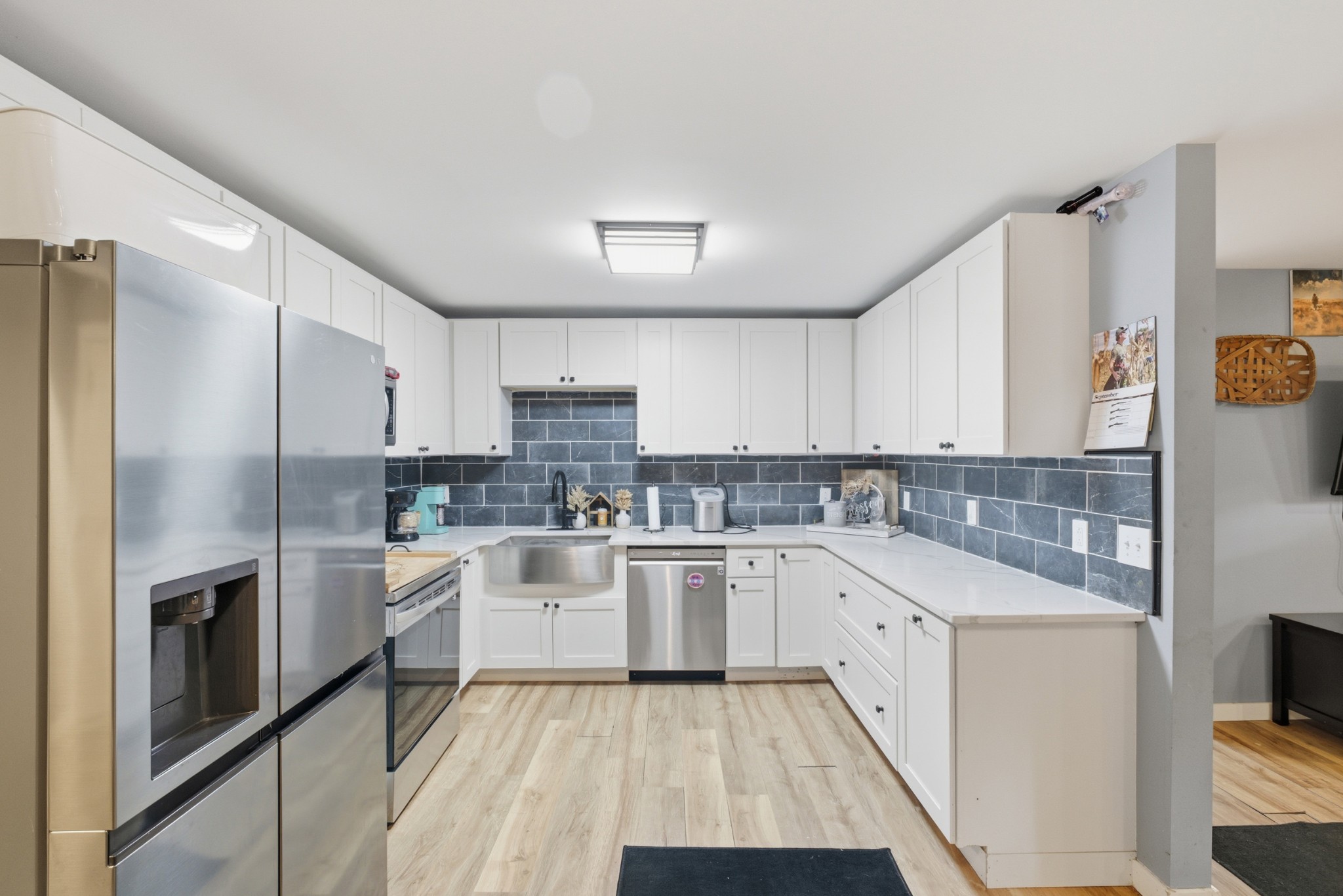 240 Myers Road Winchester, TN 37398 - Photo 14 of 38 a kitchen with a sink cabinets stainless steel appliances and a window