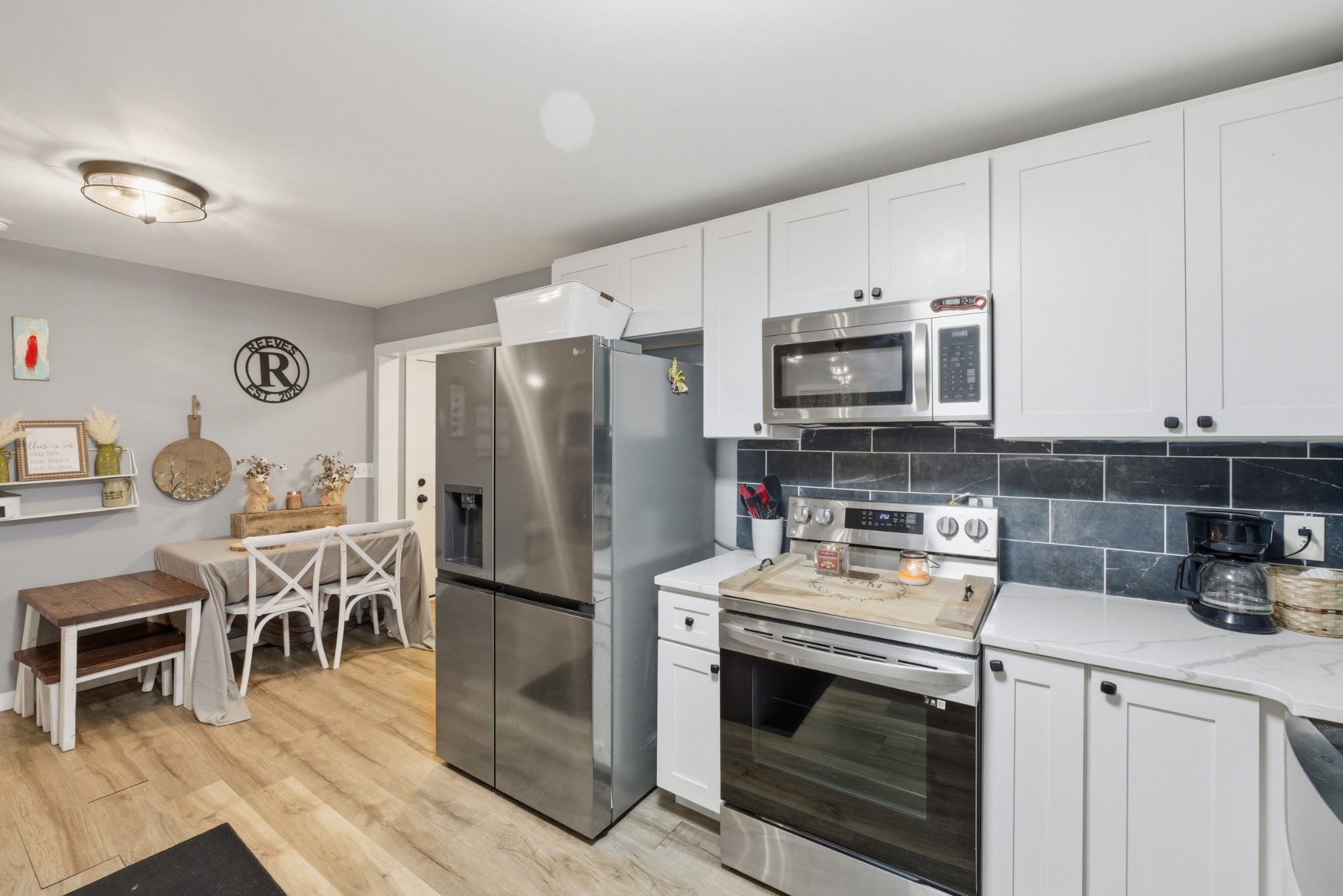 240 Myers Road Winchester, TN 37398 - Photo 15 of 38 a kitchen with a stove microwave and refrigerator