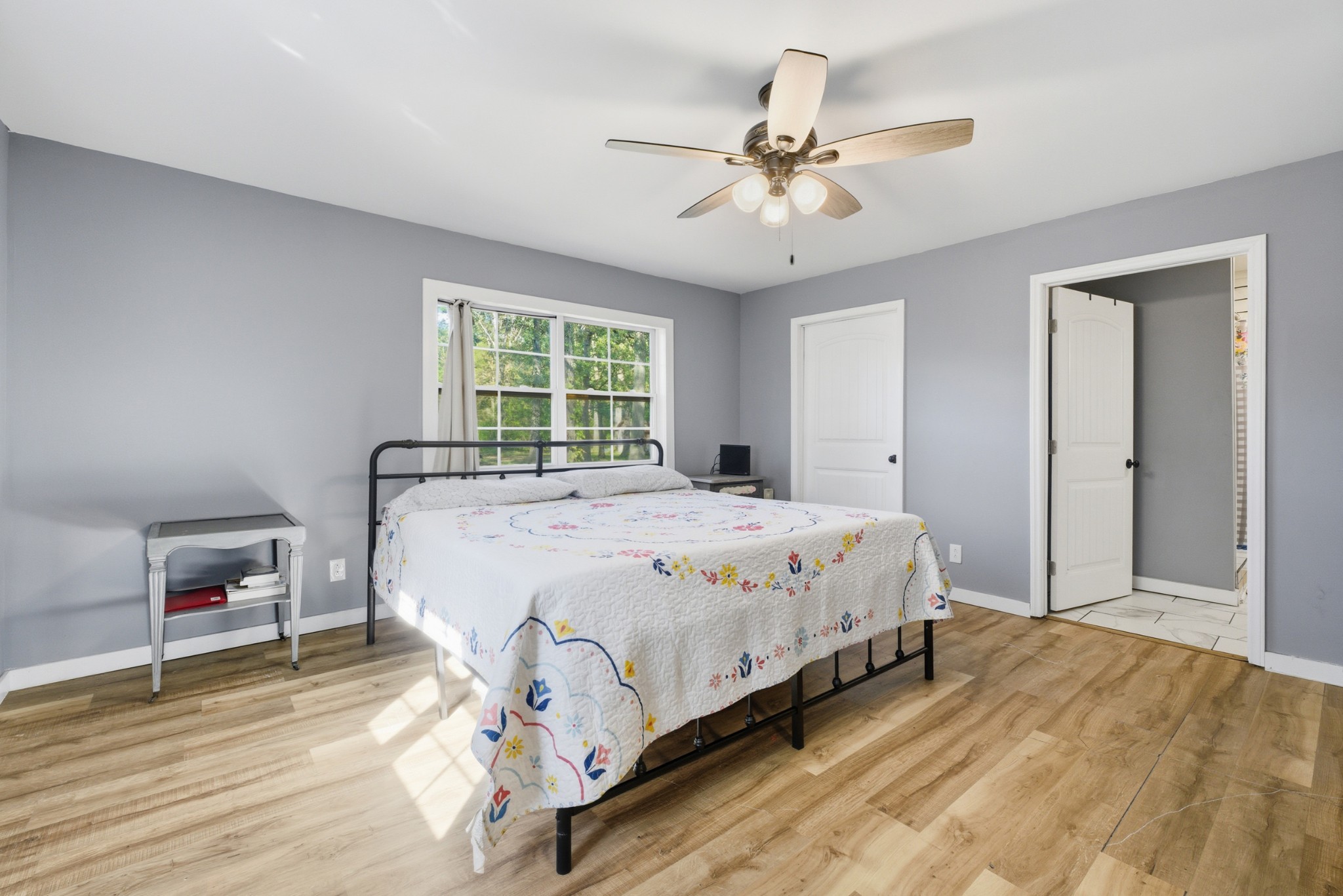 240 Myers Road Winchester, TN 37398 - Photo 18 of 38 a bedroom with a bed and a bookshelf