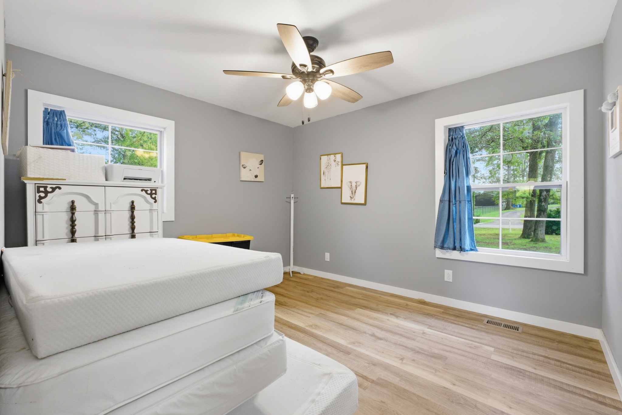 240 Myers Road Winchester, TN 37398 - Photo 29 of 38 a bedroom with a bed and a chandelier