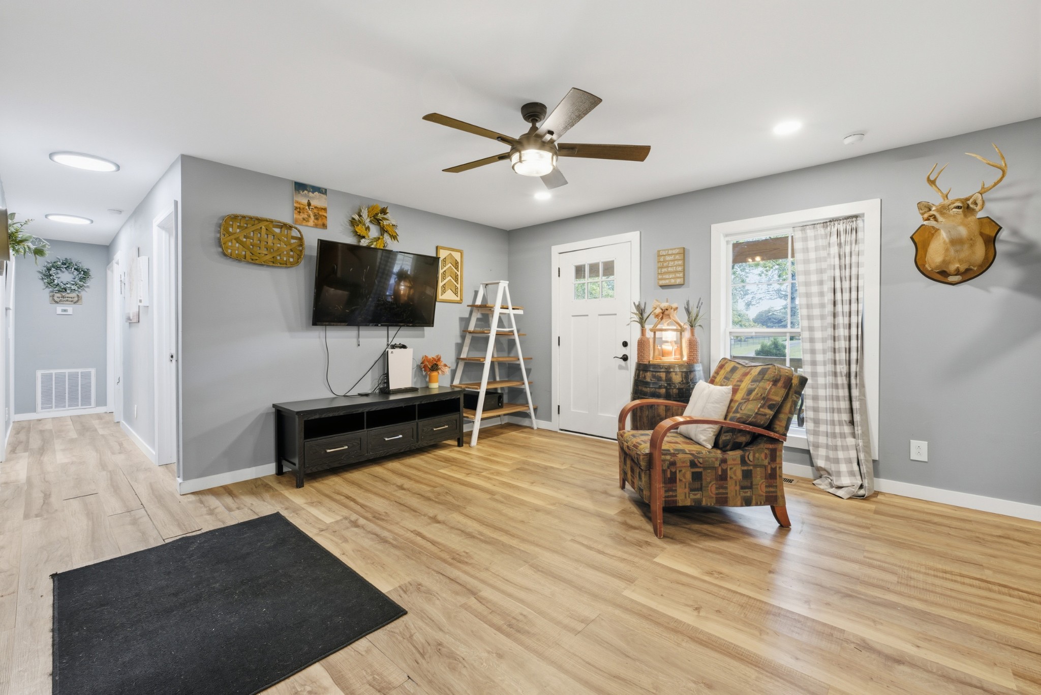 240 Myers Road Winchester, TN 37398 - Photo 7 of 38 a living room with furniture and a flat screen tv