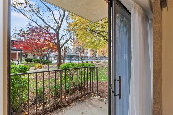 a view of a street from a balcony