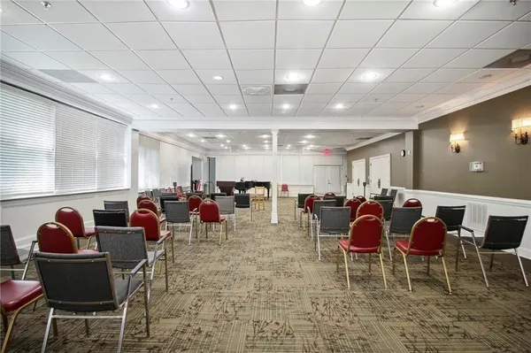 a group of people sitting in a room