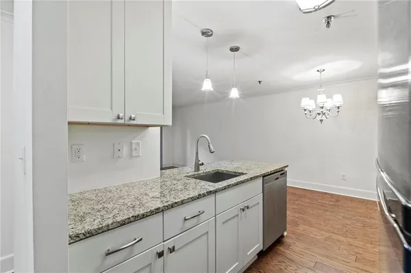 a bathroom with a sink and vanity