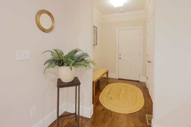 93 Calvary Street, Unit 2 Waltham, MA 02453 - Photo 18 of 33 a view of entryway with wooden floor