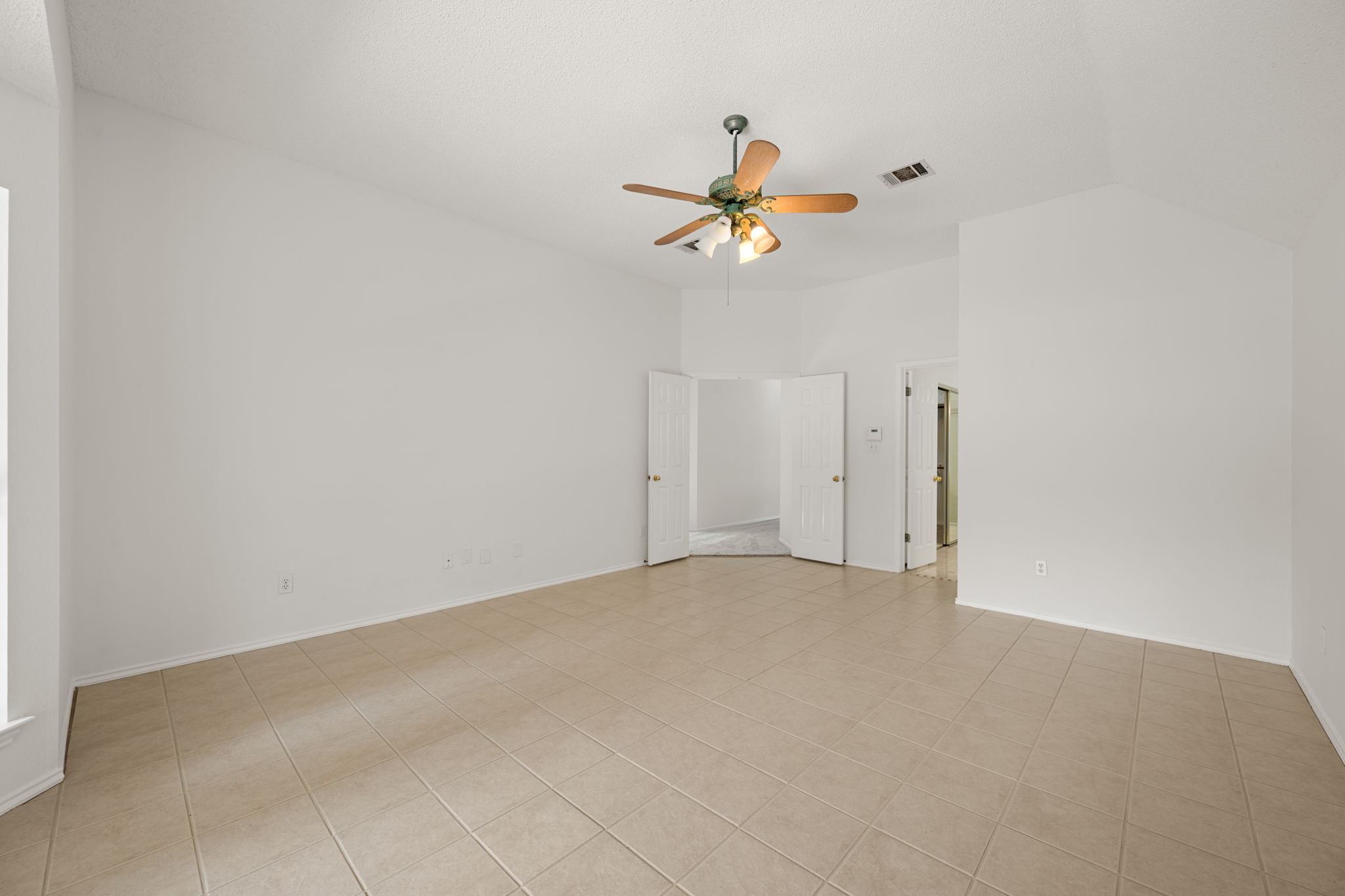 707 Ridge View Drive Leander, TX 78641 - Photo 23 of 40 a view of room with a ceiling fan and window