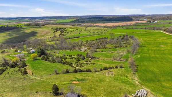 a view of a lake with a big yard