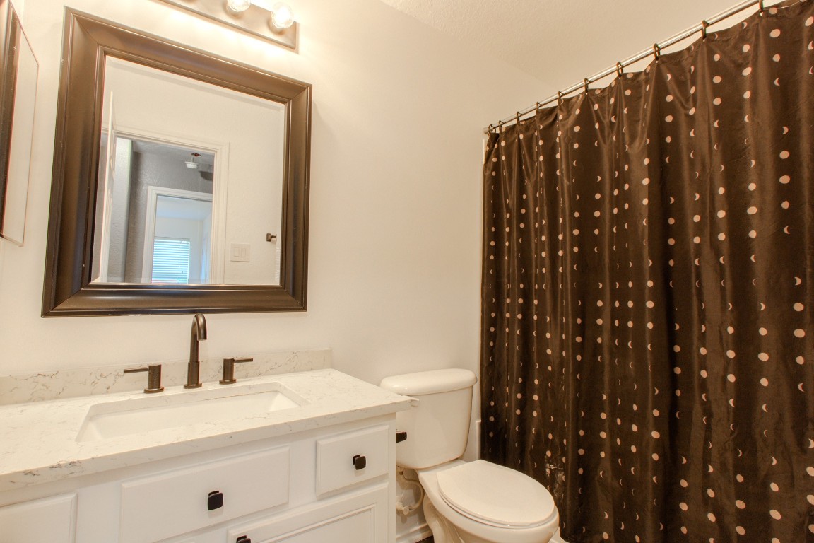 21906 Trapper Lake Drive Spring, TX 77388 - Photo 19 of 21 The upstairs bath also features a sleek countertop and updated fixture.