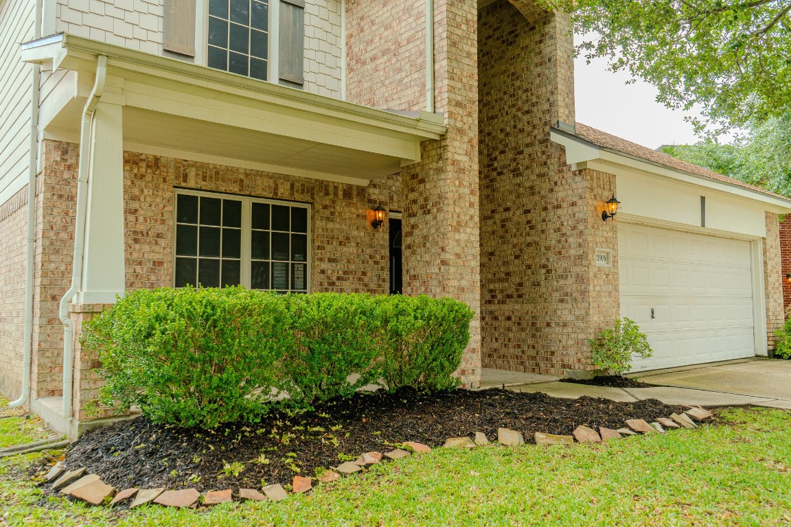 21906 Trapper Lake Drive Spring, TX 77388 - Photo 3 of 21 A charming front porch will be complete with a bench or a pair of rocking chairs.