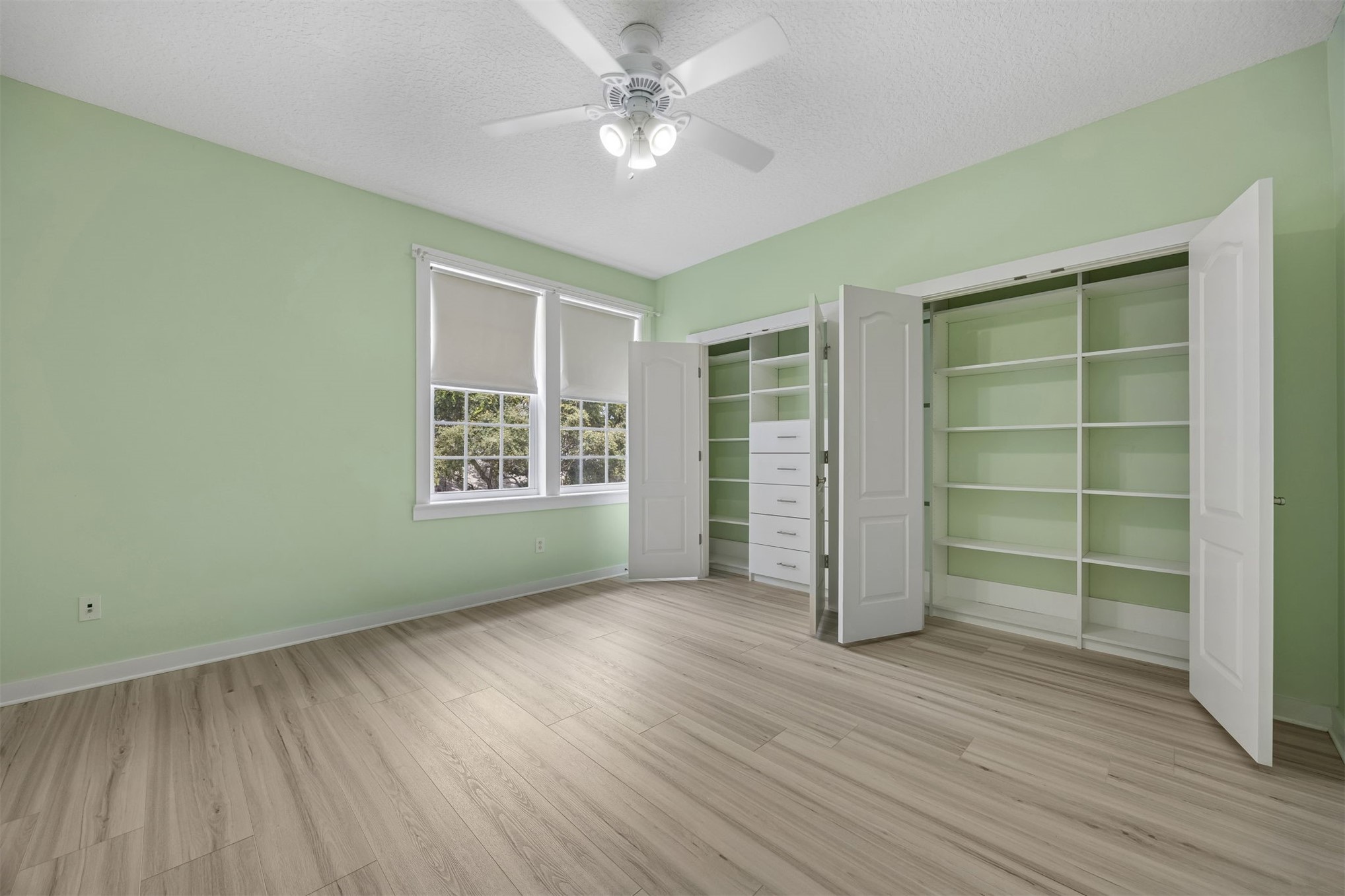1855 Perimeter Park Road West Fernandina Beach, FL 32034 - Photo 29 of 83 Level 2 Guest Bedroom 1 with Customized Closets