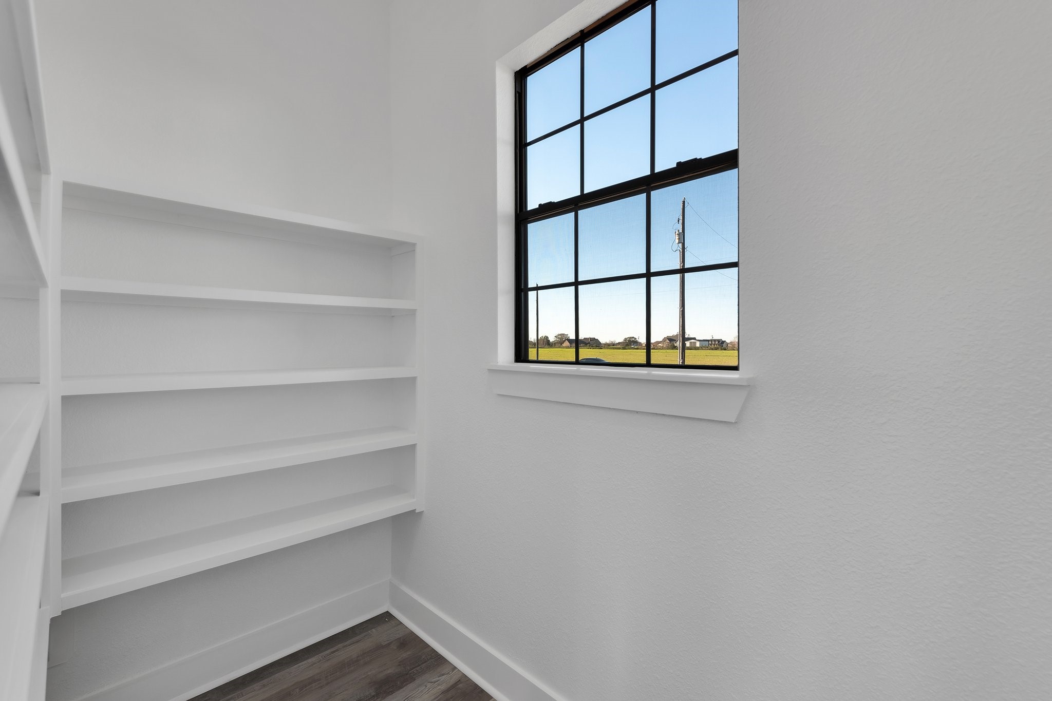 519 Chuckwagon Trail Angleton, TX 77515 - Photo 23 of 34 a view of a room that has a window
