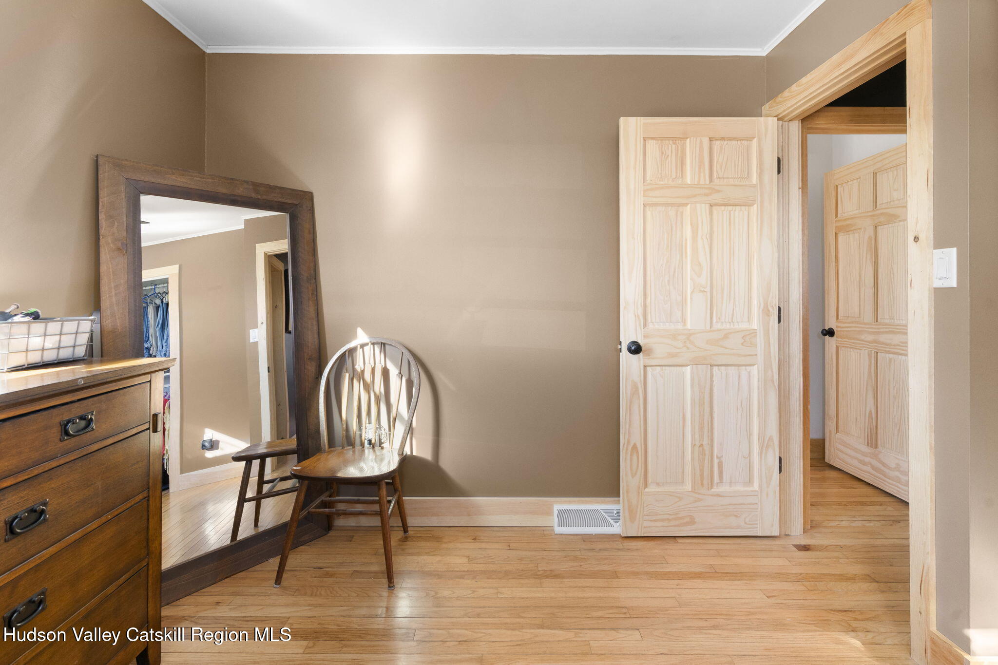 437 Sharptown Road Stuyvesant, NY 12173 - Photo 23 of 39 a view of dining room with wooden floor and chair
