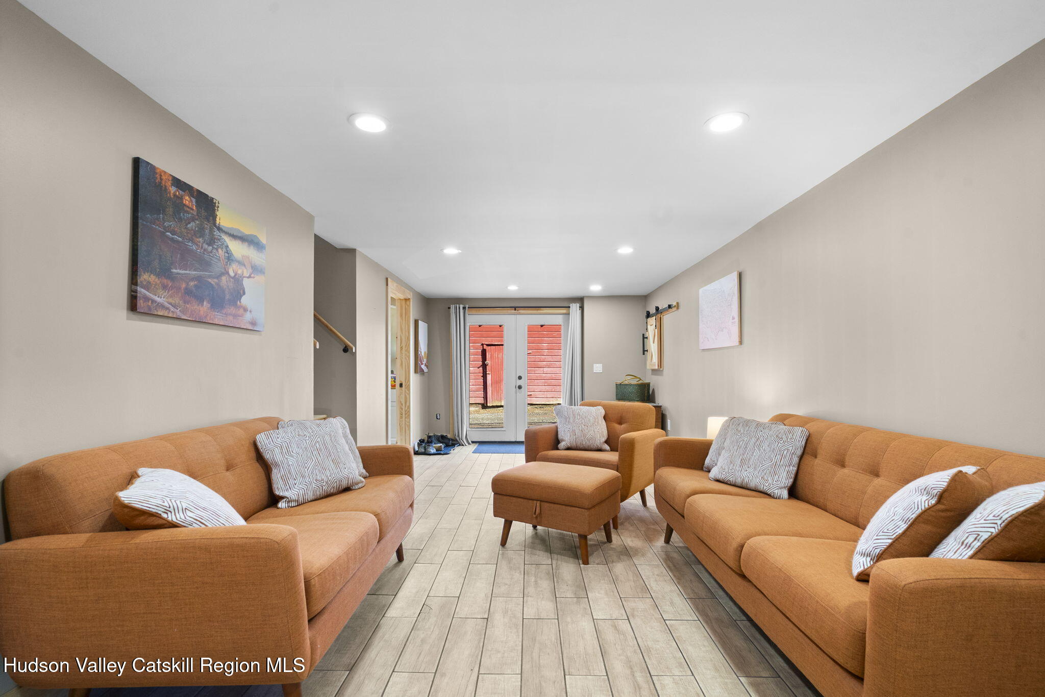 437 Sharptown Road Stuyvesant, NY 12173 - Photo 28 of 39 a living room with furniture and a couch