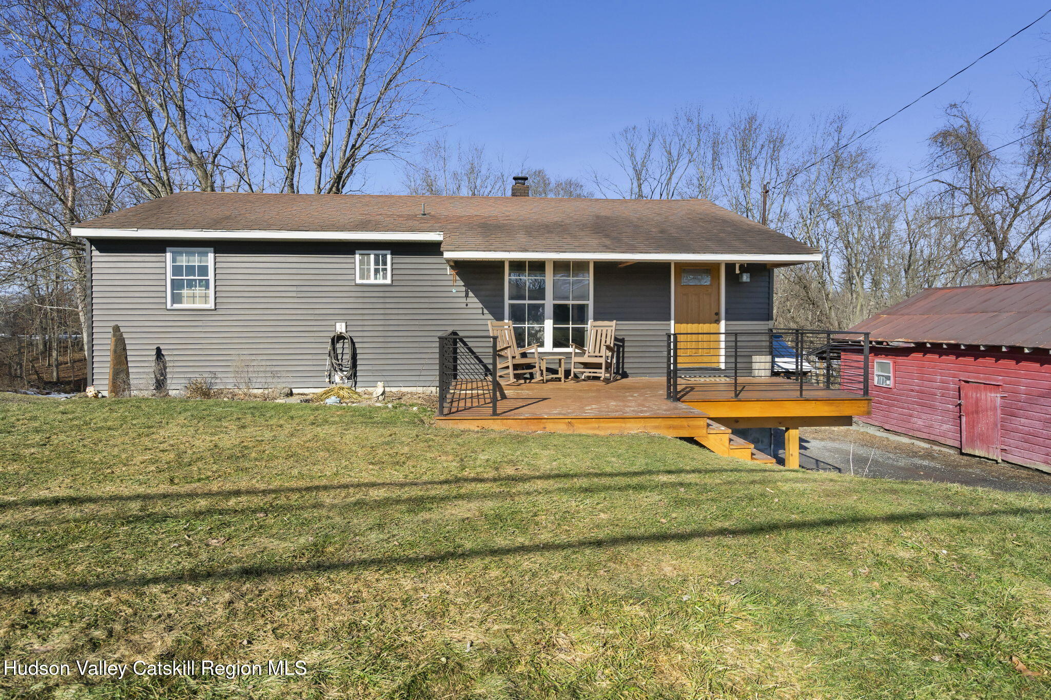 437 Sharptown Road Stuyvesant, NY 12173 - Photo 3 of 39 a front view of a house with swimming pool and porch