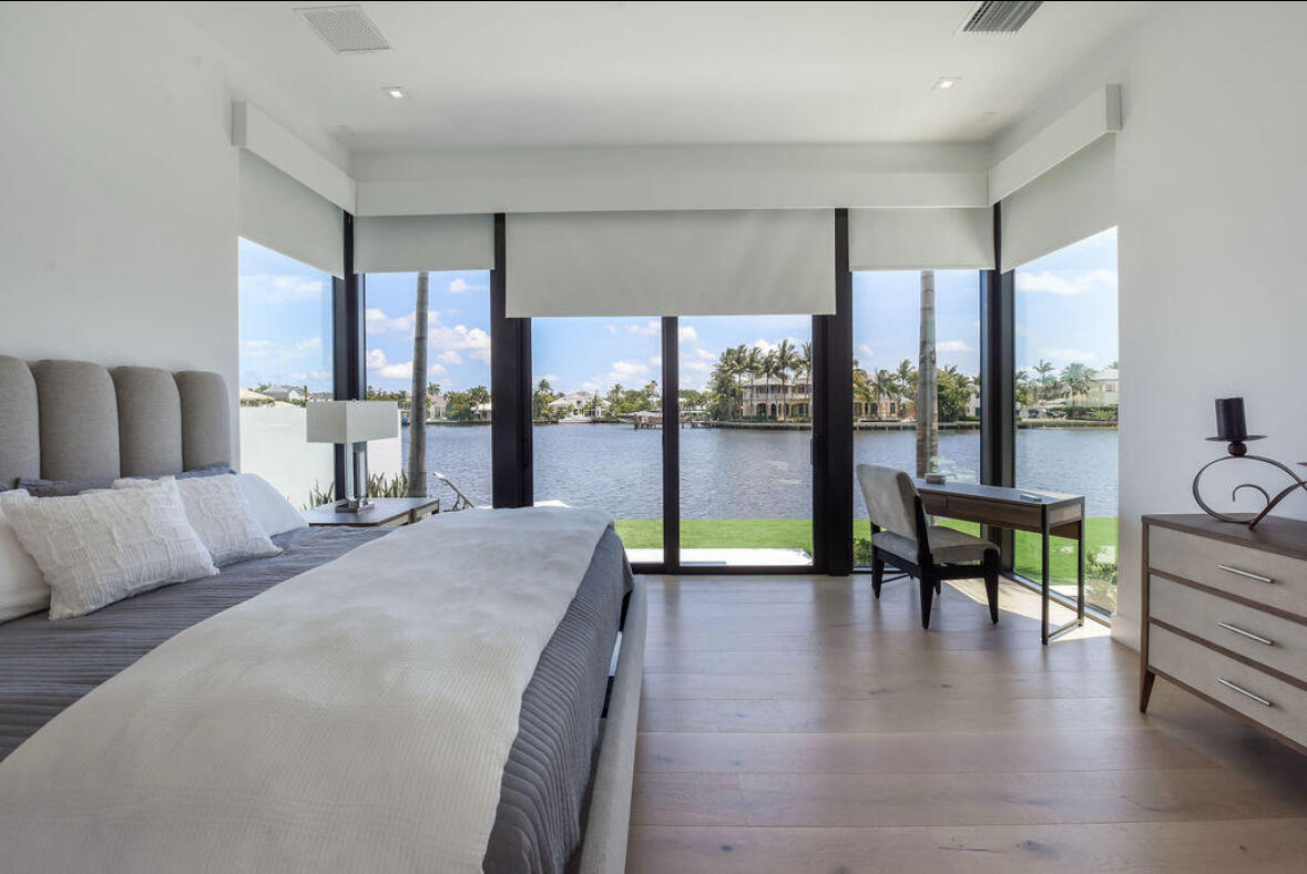 718 Southeast 7th Street Delray Beach, FL 33483 - Photo 16 of 25 a living room with furniture and a floor to ceiling window