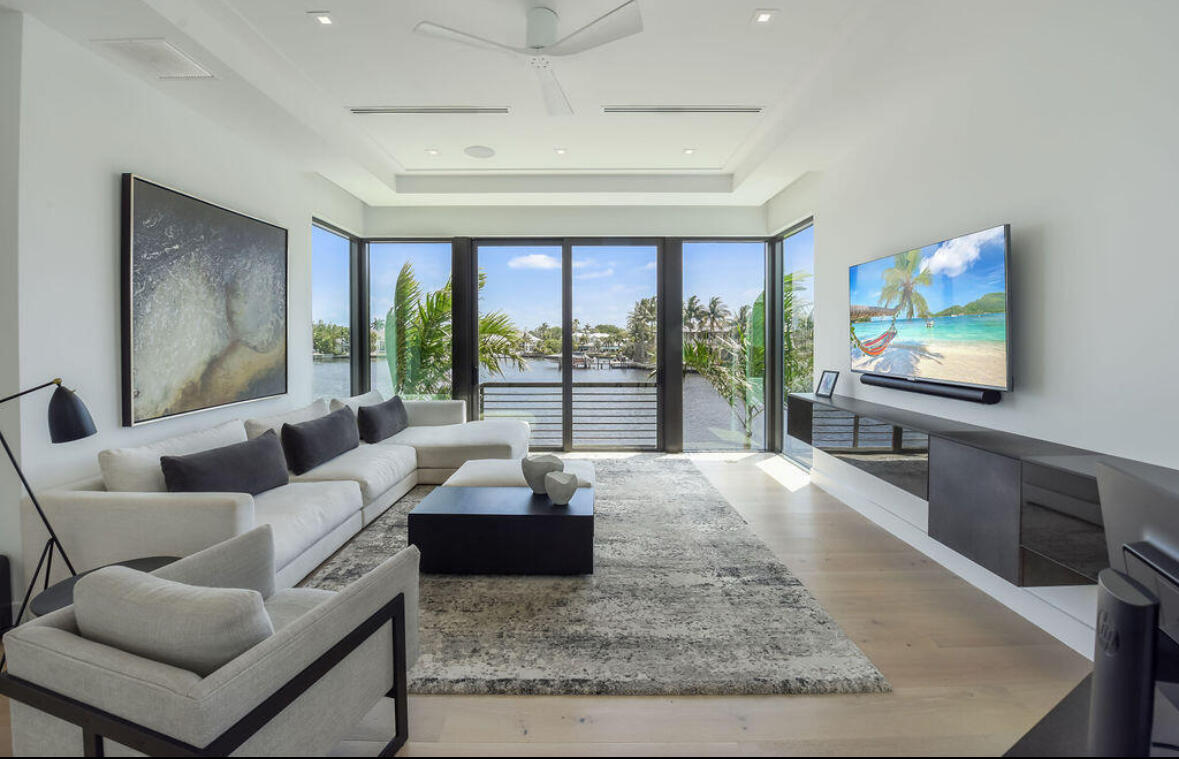 718 Southeast 7th Street Delray Beach, FL 33483 - Photo 9 of 25 a living room with furniture and a flat screen tv