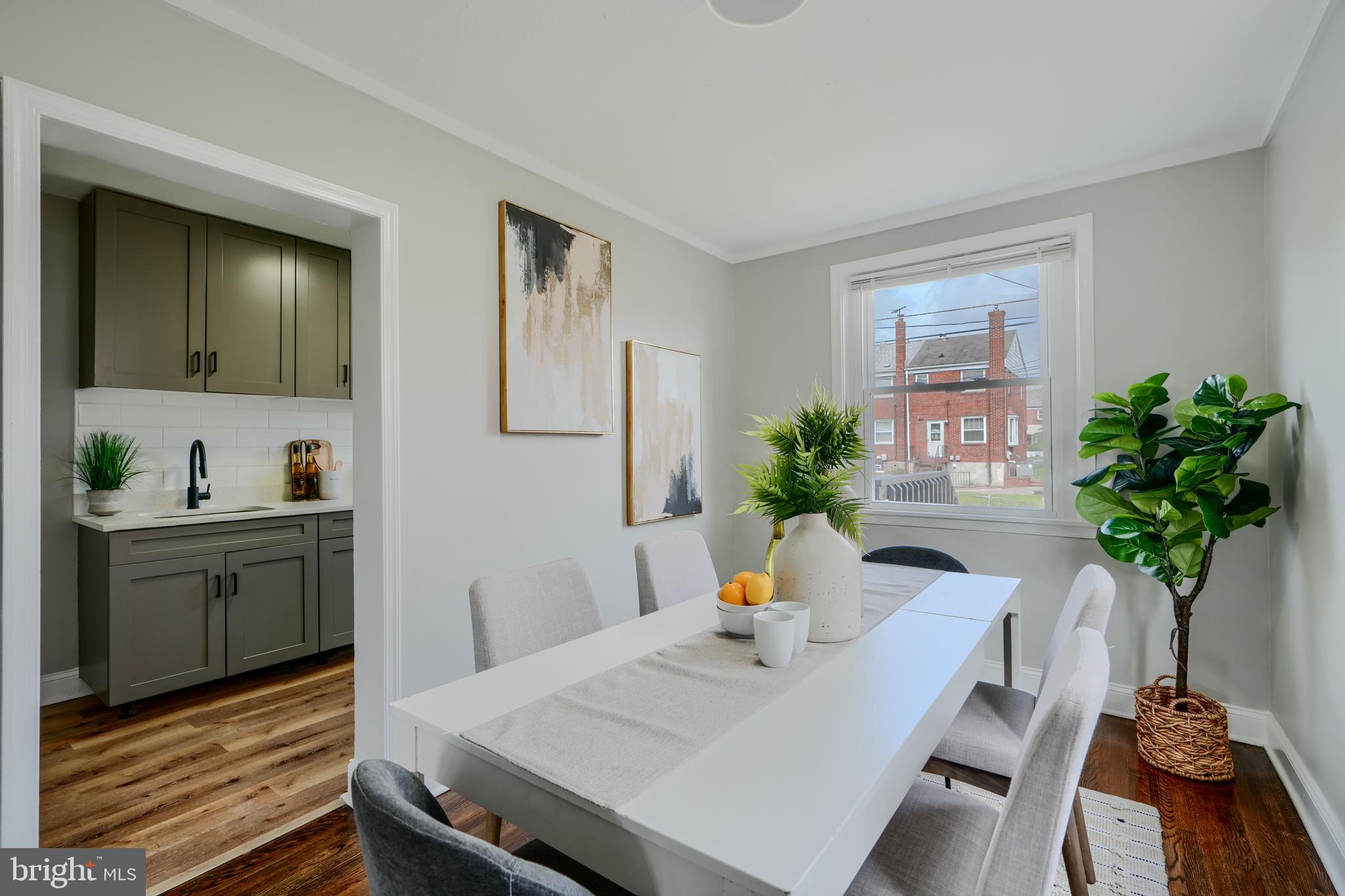 1944 Quentin Road Dundalk, MD 21222 - Photo 12 of 41 a view of a dining room with furniture and wooden floor