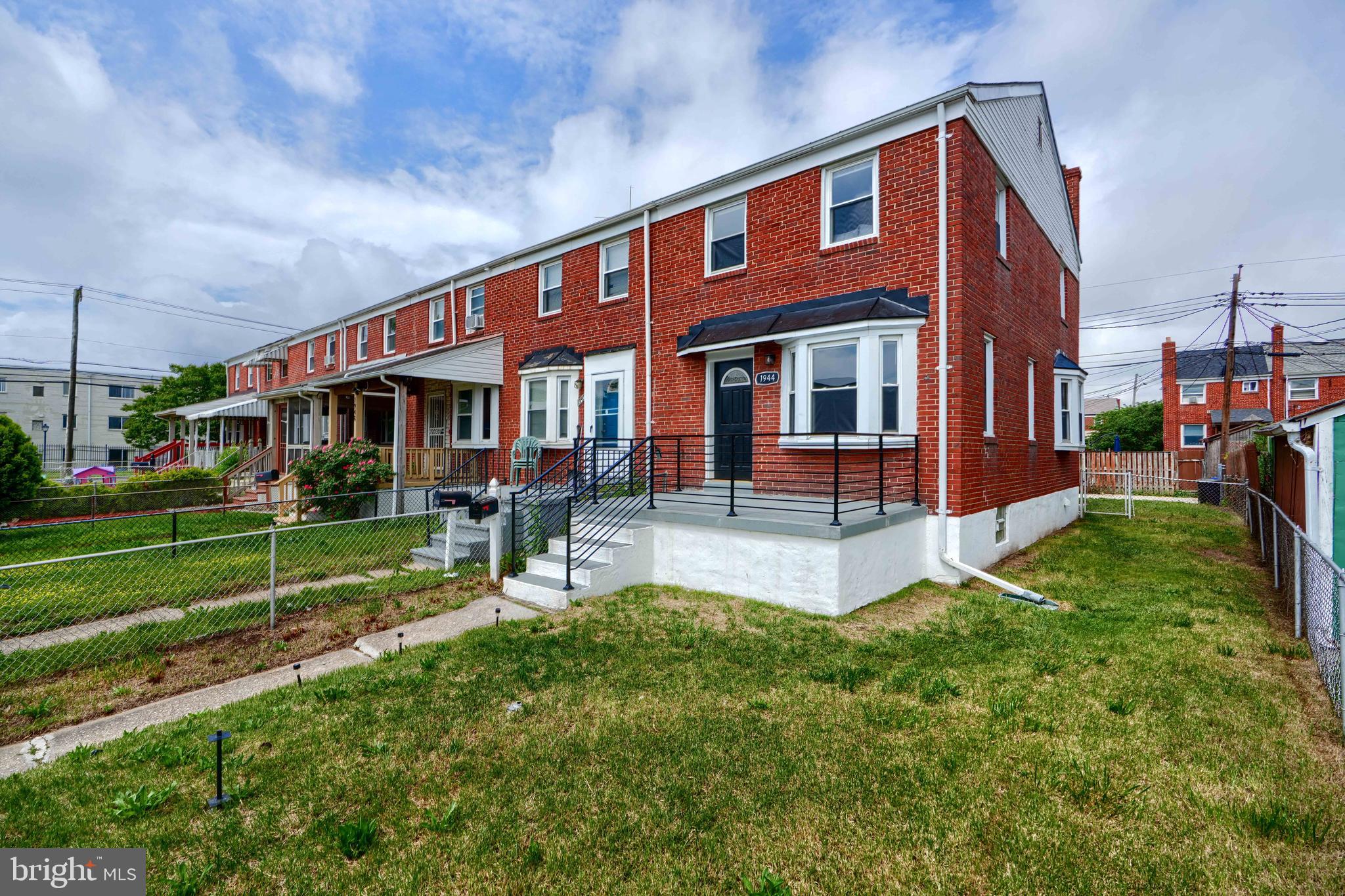 1944 Quentin Road Dundalk, MD 21222 - Photo 2 of 41 a front view of house with yard and outdoor seating