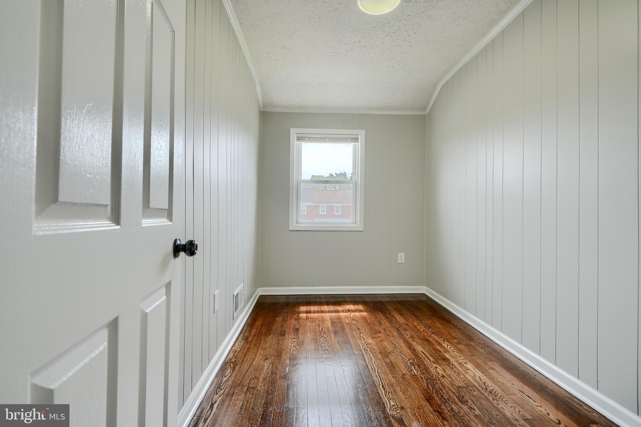1944 Quentin Road Dundalk, MD 21222 - Photo 24 of 41 a view of a room with wooden floor and staircase