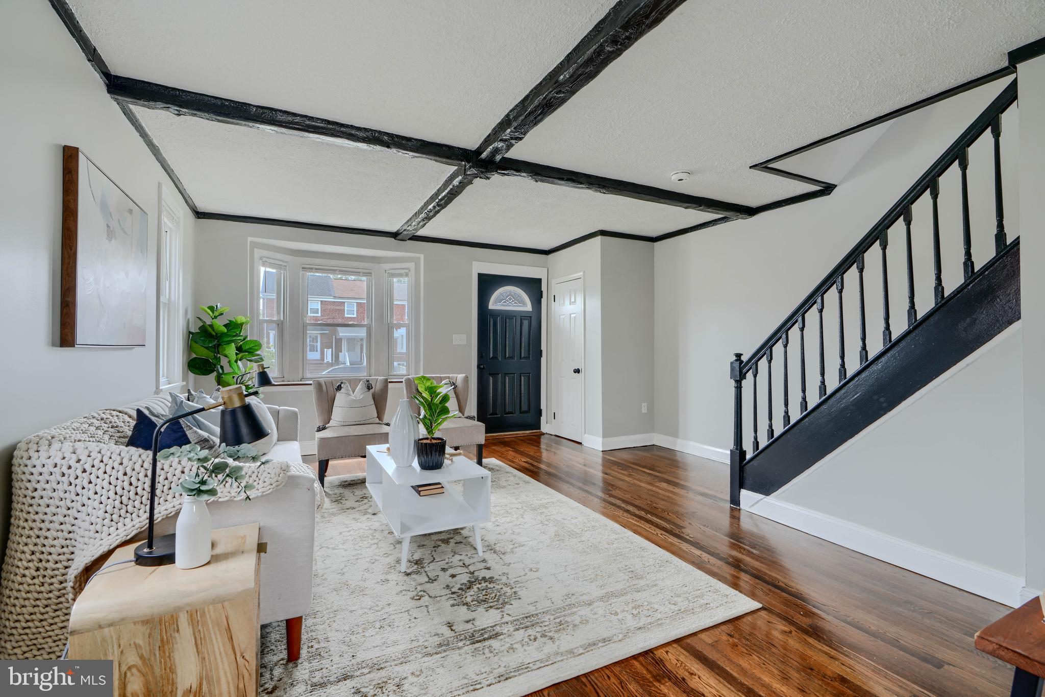 1944 Quentin Road Dundalk, MD 21222 - Photo 3 of 41 a living room with furniture wooden floor and a chandelier