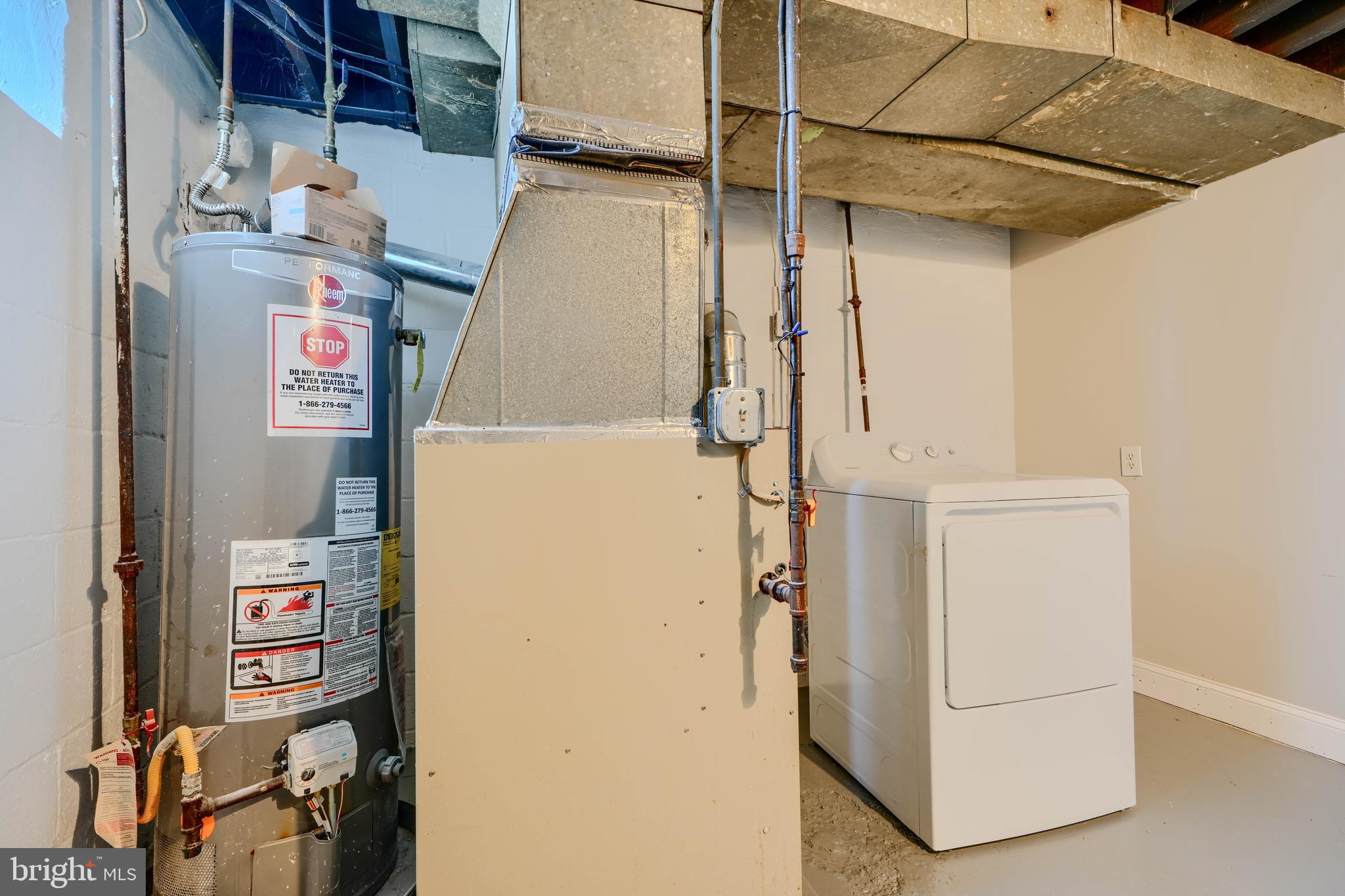 1944 Quentin Road Dundalk, MD 21222 - Photo 36 of 41 a utility room with dryer and washer
