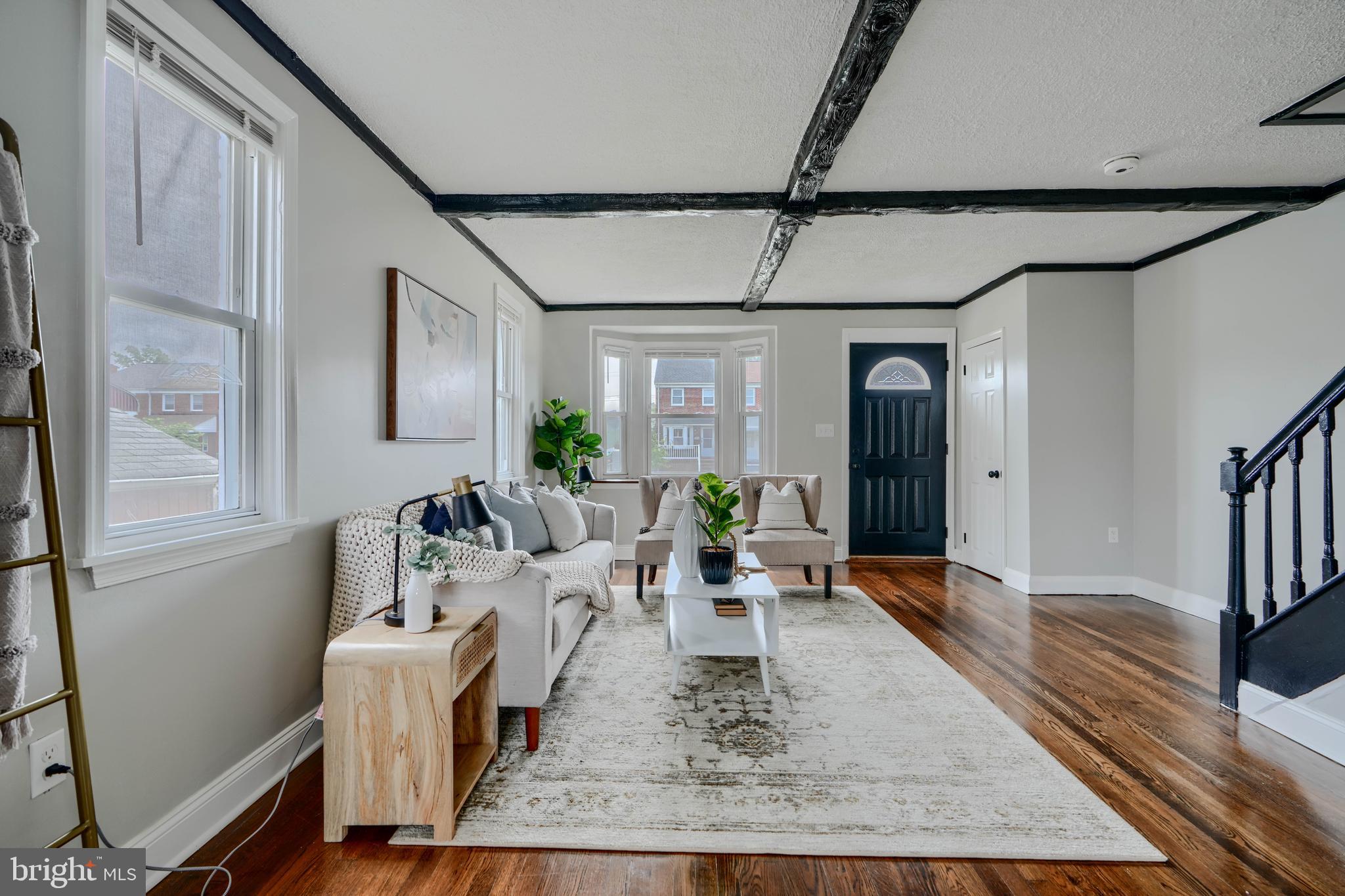 1944 Quentin Road Dundalk, MD 21222 - Photo 4 of 41 a living room with furniture wooden floor and white walls