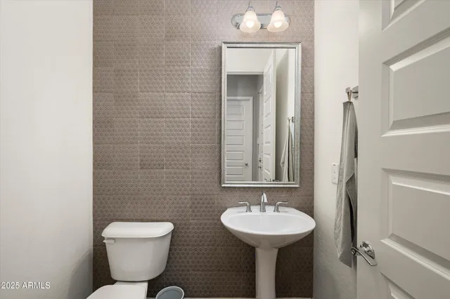 a view of a chairs and table in patio