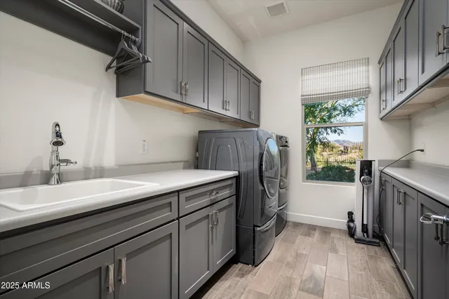 a view of a chairs and table in patio