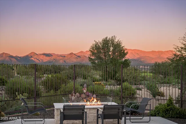 a view of house with backyard outdoor seating and green space