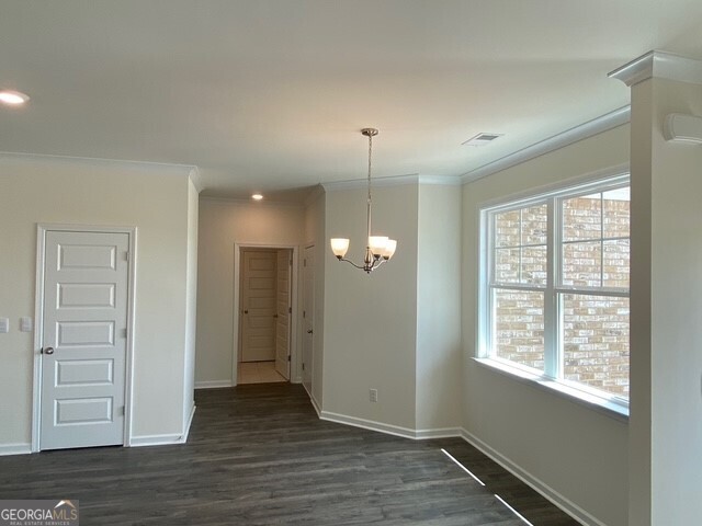 1801 Quaker Hampton, GA 30228 - Photo 23 of 37 an empty room with wooden floor and windows