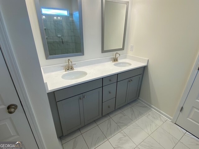 1801 Quaker Hampton, GA 30228 - Photo 35 of 37 a bathroom with a sink and a mirror