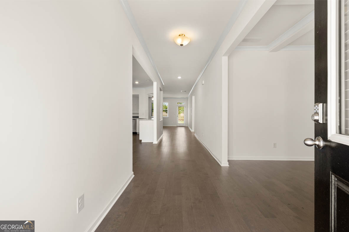 1801 Quaker Hampton, GA 30228 - Photo 8 of 37 a view of a hallway with wooden floor