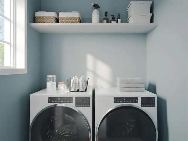 a utility room with dryer and washer