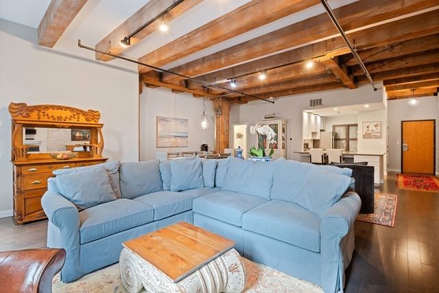 a view of a livingroom with furniture and a couch