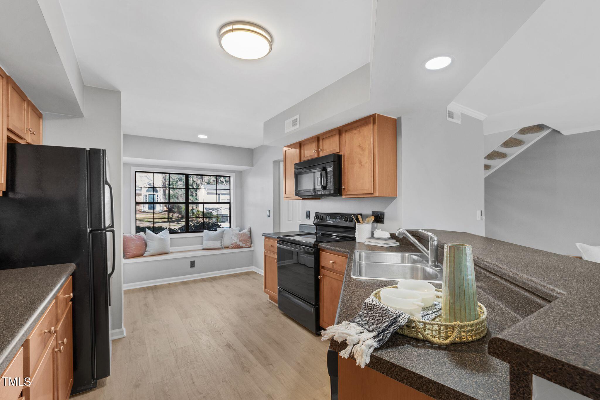 7706 Falcon Rest Circle Raleigh, NC 27615 - Photo 9 of 27 7706_Falcon_Rest_Cir_Raleigh_NC_27615_US
