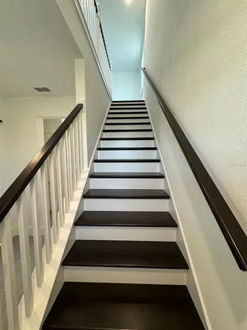 an empty room with a empty space and window