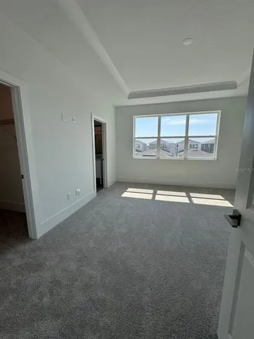 a bathroom with a double vanity sink toilet and a shower