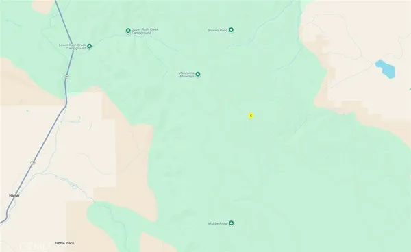 a bathroom with a sink mirror and vanity