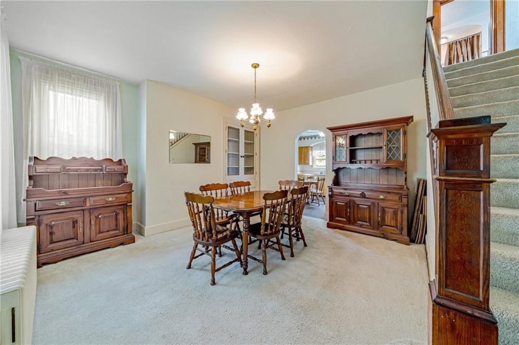 2375 Mt Pleasant Road Ruffs Dale, PA 15679 - Photo 13 of 31 a dining room with furniture and chandelier