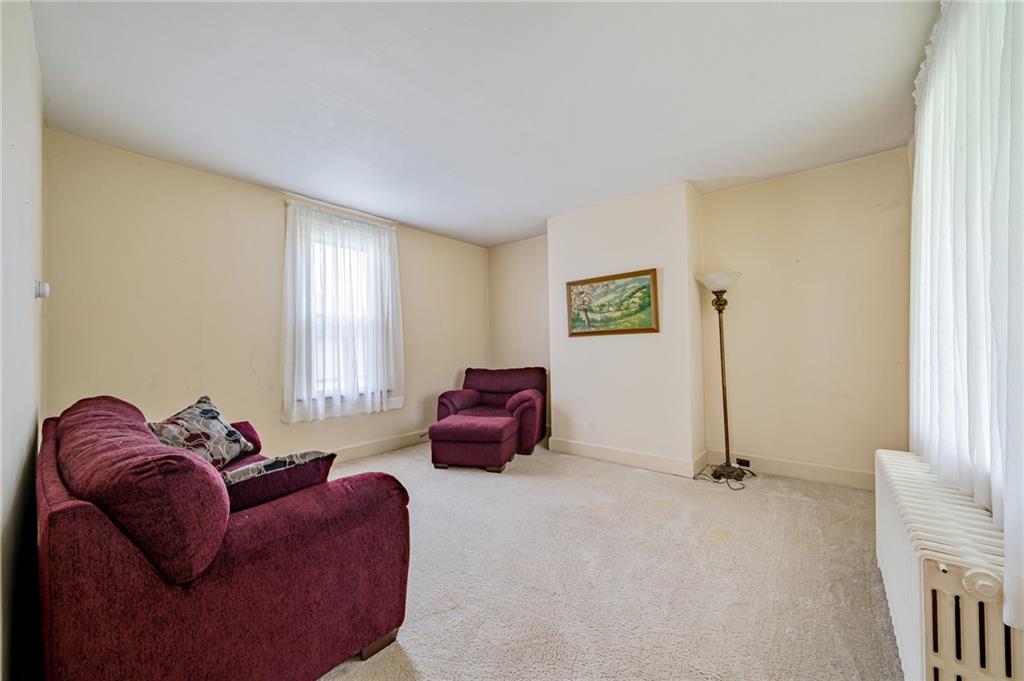 2375 Mt Pleasant Road Ruffs Dale, PA 15679 - Photo 15 of 31 a living room with furniture chess board and a window