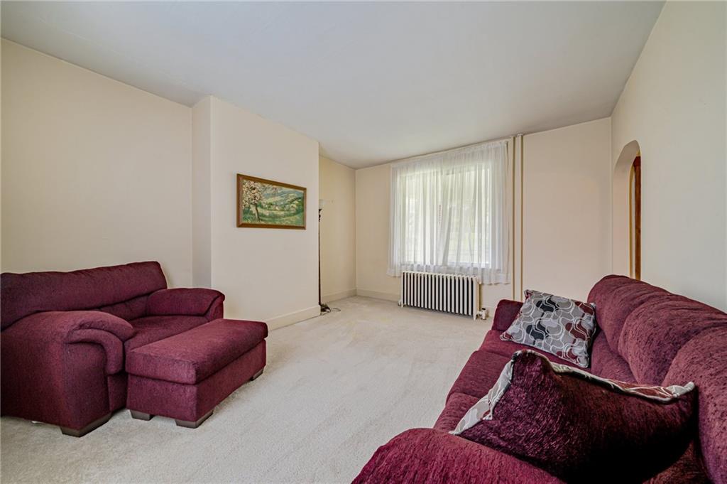 2375 Mt Pleasant Road Ruffs Dale, PA 15679 - Photo 17 of 31 a living room with furniture and a window
