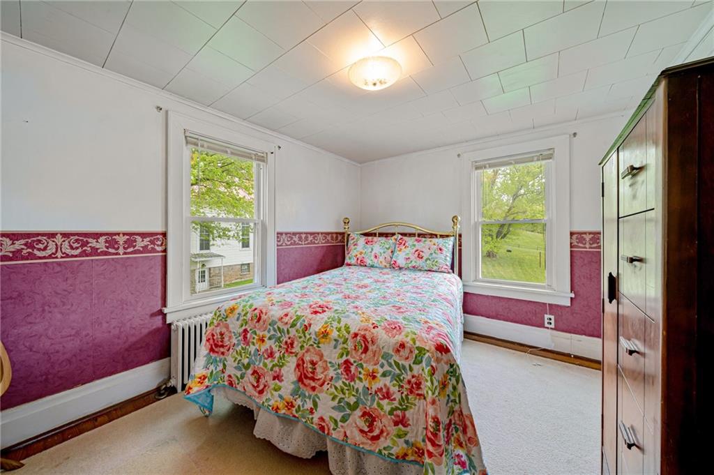 2375 Mt Pleasant Road Ruffs Dale, PA 15679 - Photo 20 of 31 a bedroom with a bed and a window