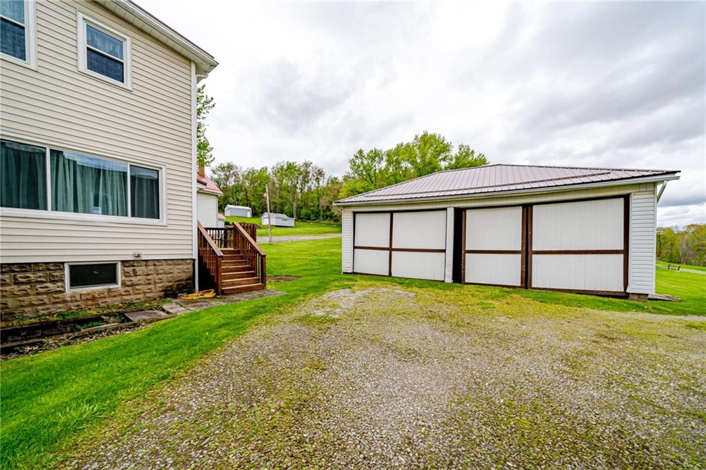 2375 Mt Pleasant Road Ruffs Dale, PA 15679 - Photo 30 of 31 a view of a house with backyard and garden